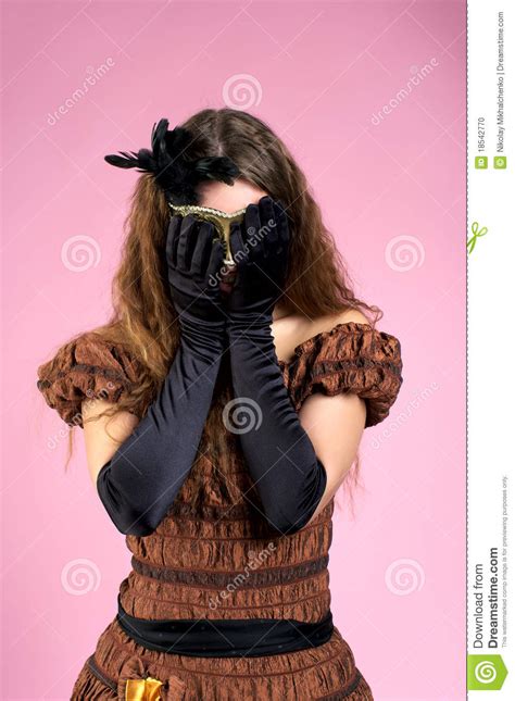 beautiful woman hiding  face  stock photo image