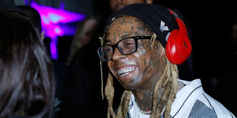 lil wayne drops tha carter v deluxe ft 2 chainz post