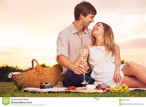 couple enjoying romantic sunset picnic stock image image of basket lifestyle 36649387
