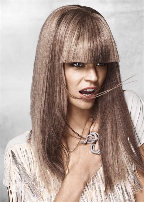long straight hairstyle with thick one length bangs