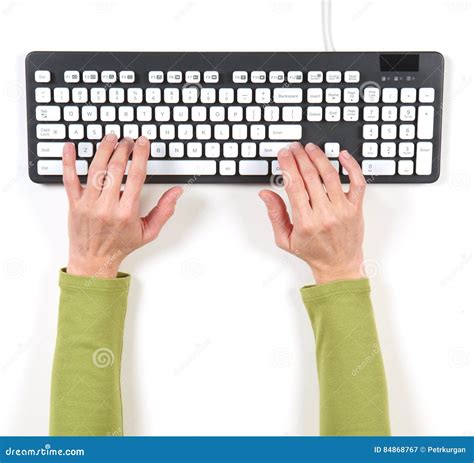 dient groen jasje en grijs toetsenbord  stock afbeelding image  mens toetsenbord