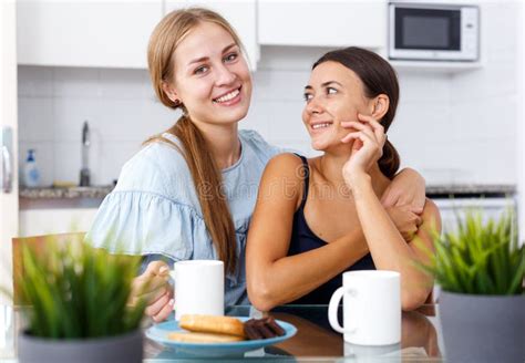 Portrait Of Young Smiling Girlfriends Having Fun Together During