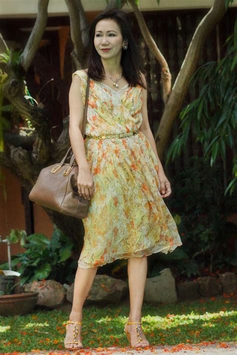 it s summer and a floral light dress seems perfect in the tropics