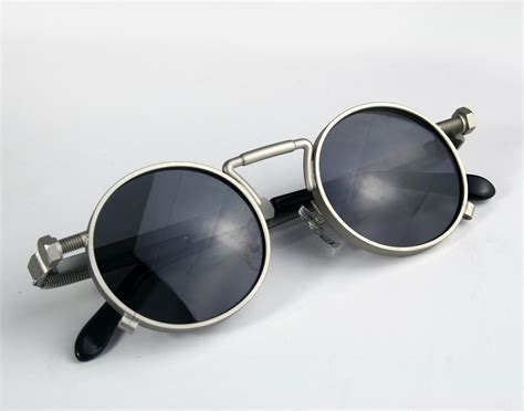 round steampunk sunglasses with spring on temples silver metal frame