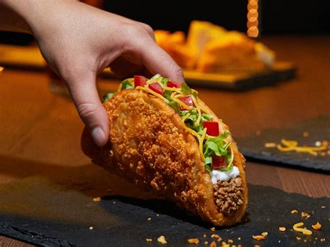 taco bell  releasing   chalupa  cheddar cheese baked   shell