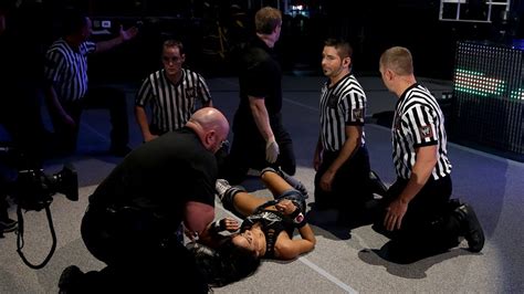 paige attacks aj lee after her match with rosa mendes