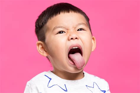 boy sticking  tongue wyoming department  health
