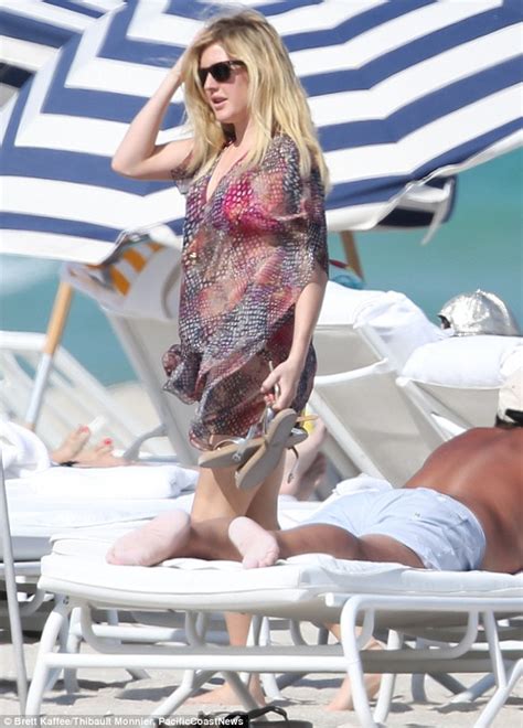 Ellie Goulding In Hot Pink Bikini While Enjoying A Beach Day With Male