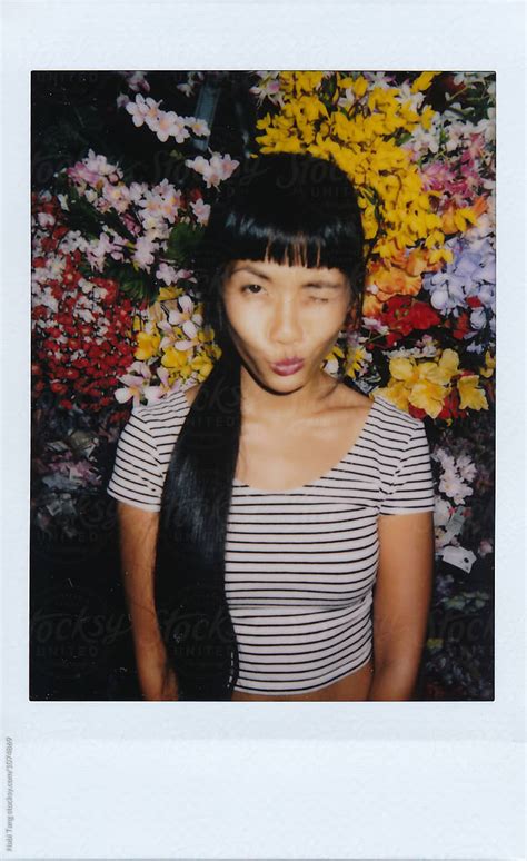 Polaroid Portrait Photo Of Asian Young Woman On Flower Background By