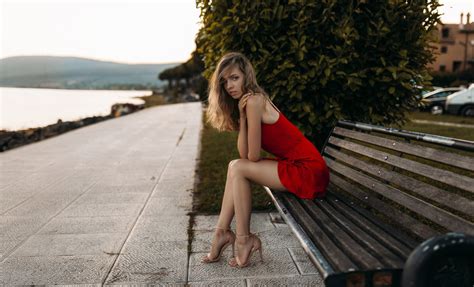 Model Sitting On Bench In Red Dress Hd Girls 4k Wallpapers Images