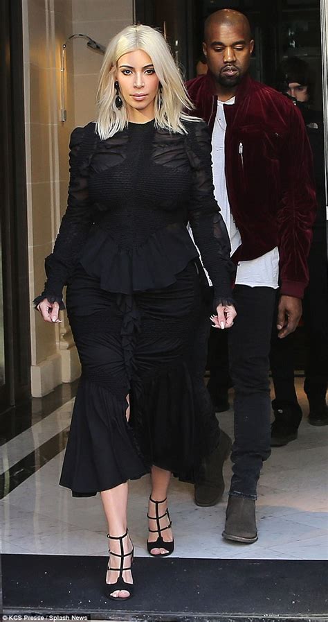 kim kardashian appears braless for dinner with husband kanye west