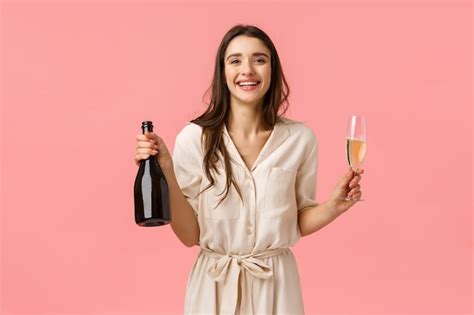 Premium Photo Brunette Girl Holding Wine Bottle And Glasses
