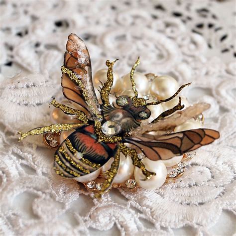 queen bee glass wing with premium paper body layer reneabouquets