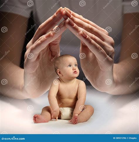 hands protect  child stock photo image