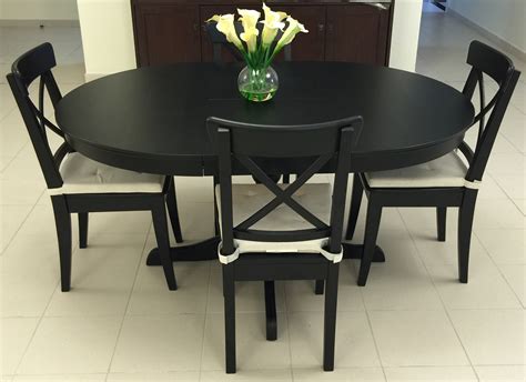ikea ingatorp extendable dinning room table  ingolf chairs qatar