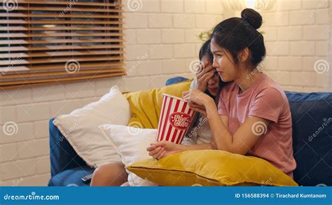 Lesbian Lgbt Women Couple Watching Movie At Home Asian Female Lover