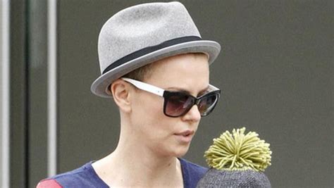 omg guess who shaved her head charlize theron omg blog