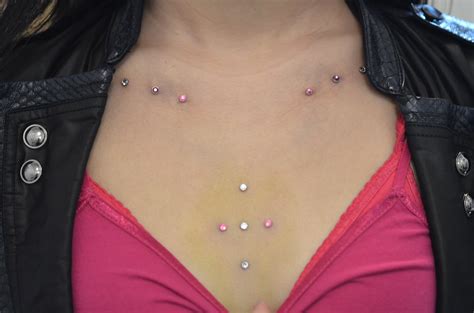 Dermal Anchor Piercings On Girl Collarbones