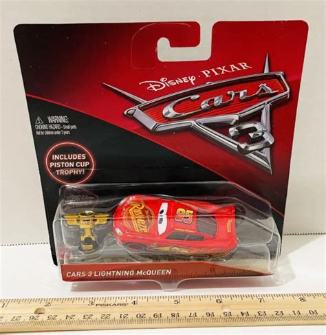 Disney Pixar Cars Lightning Mcqueen With Piston Cup Trophy New For