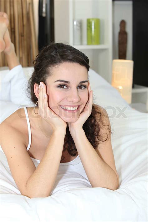 Brunette Thinking Whilst On Bed Stock Image Colourbox