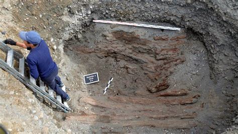 macabre mystery as archaeologists unearth headless woman