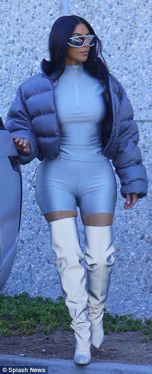 Kim Kardashian Shines In Silver Thigh High Boots And