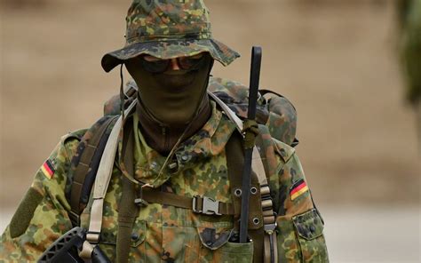 german soldiers offered  travel  uniform  boost army visibility