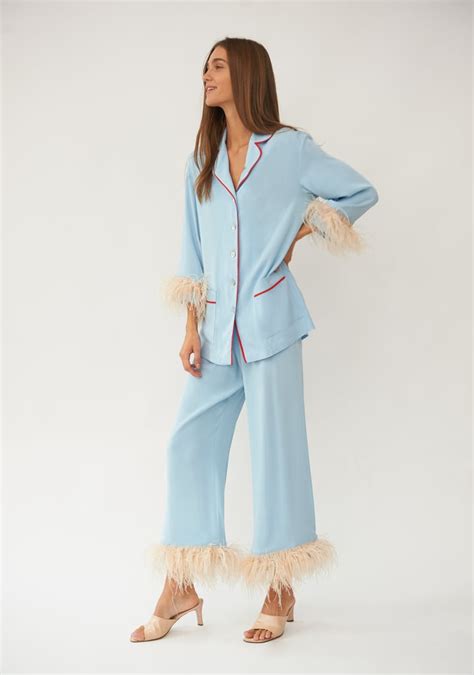 sleeper party pajama set with feathers in blue these feathered pjs