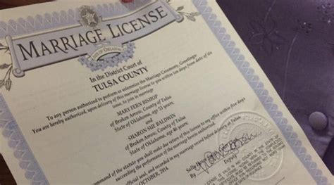 Same Sex Tulsa Couple Sign Marriage License