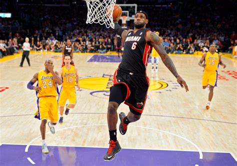 perfectly timed photo  lebron james dunking   lakers