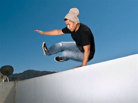 jumping   wall stock image image  risk jump