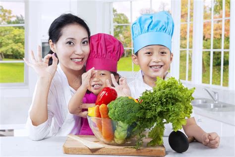family preparing food  stock image image  parent female