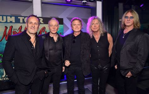 def leppard share  track kick  announce  album   years