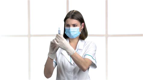 beautiful brunette nurse with syringe female stock footage sbv