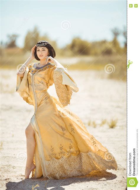 Beautiful Woman Like Egyptian Queen Cleopatra On In Desert