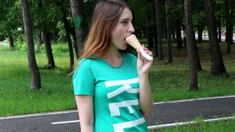 Cute Woman Eating Ice Cream In The Park Stock Video Video Of Healthy