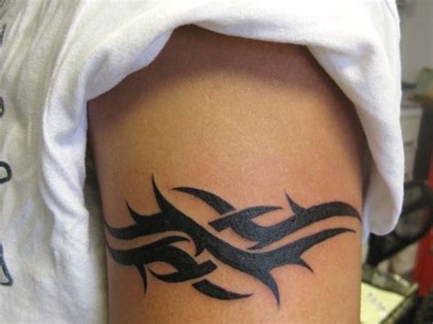 25 Lively Tribal Band Tattoos Slodive
