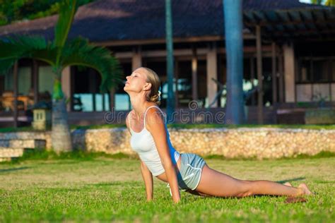 woman doing yoga exercise outdoors stock image image of nature