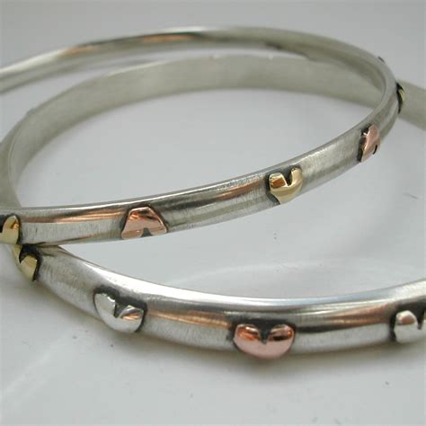 bangle  brass  ct rose gold hearts contemporary bangles  contemporary jewellery