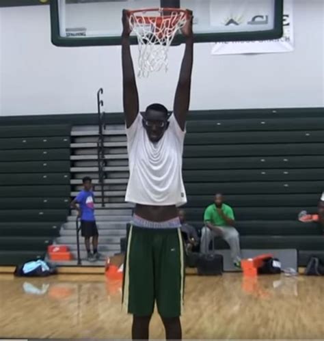 tacko fall  dunk   tip toes standing reach  foot  inches tacko fall  ucf height