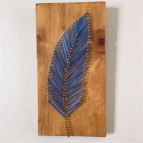 single feather string art