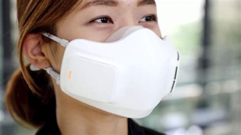 innovative battery powered face mask filters air coming into and