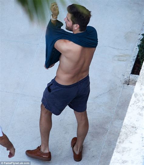 scott disick lounges at the pool and the beach while in miami daily