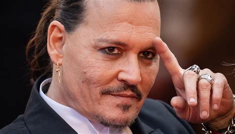 johnny depp returns to cannes film festival amid controversy and
