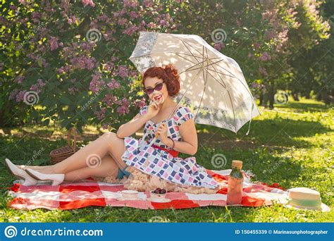 Red Haired Happy Pin Up Girl In Vintage Summer Dress And Classic