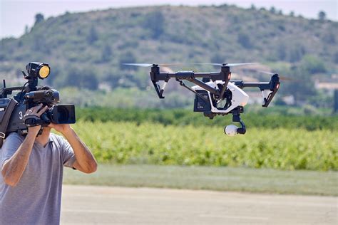 camera men film  drone  flight robotics business review