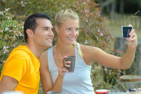 Couple Outdoor Taking Selfie As Tourist Stock Image Image Of Raised