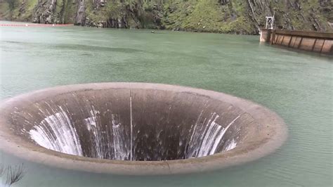 ‘glory hole at california s lake berryessa spills over for first time