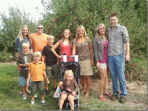 parents   dozen family apple picking