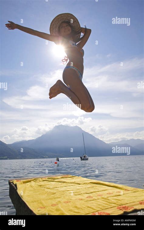 woman jumping stock photo royalty  image  alamy